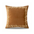 Brown pillow with decorative gold trim on a white background