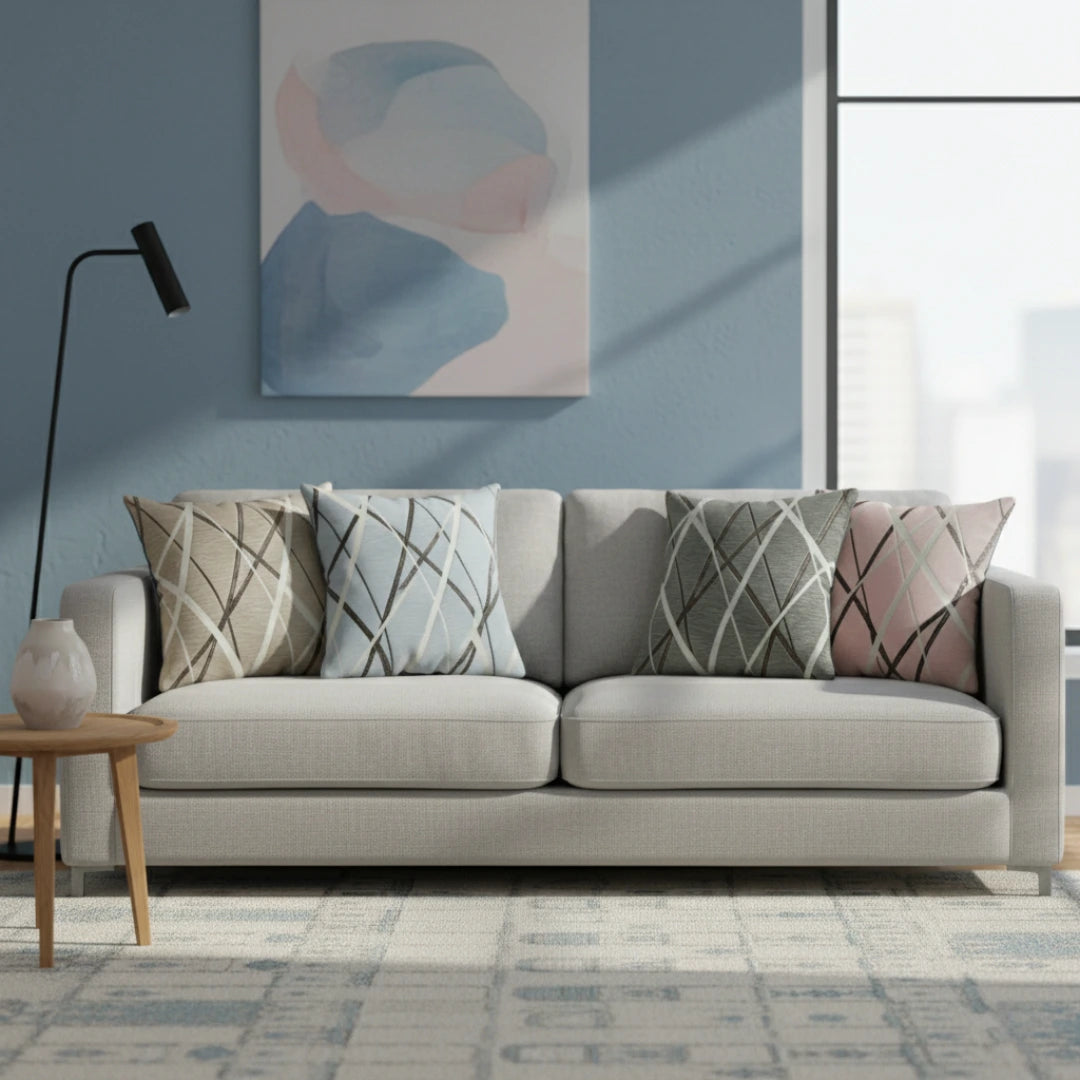 Gray sofa with patterned cushions in a modern living room.